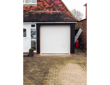 Roller Shutter Garage Door in White PVC Finish.