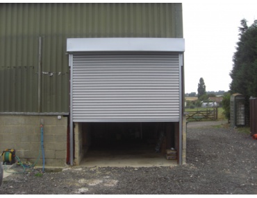 This warehouses overall functionality and safety was much improved by our installation of a galvanised steel roller shutter door.