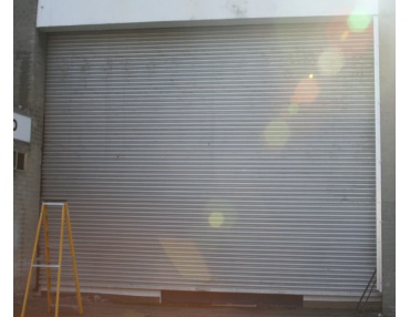 Impact damage to this roller shutter door installation left this entrance in need of a full repair. The customers were delighted when our engineers swiftly restored the shutter to complete working order.