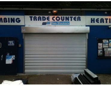 Roller shutter with automated opening installed.